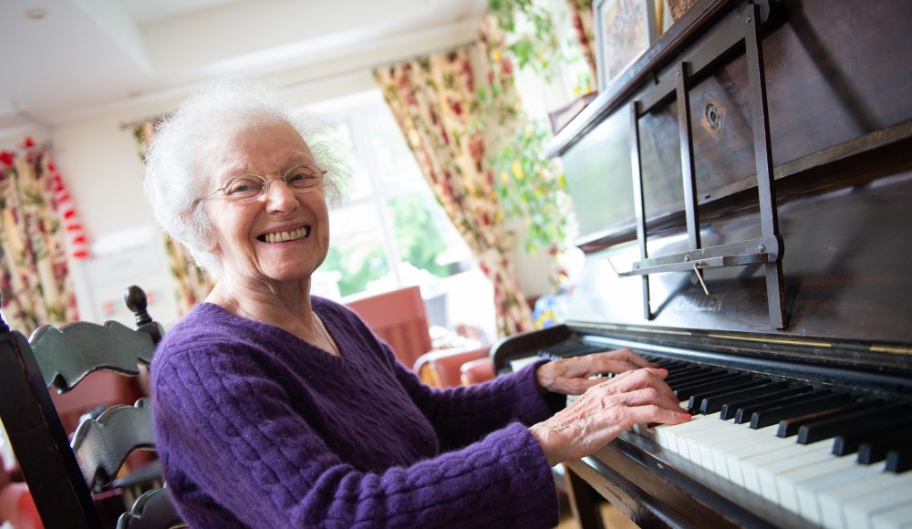 Resident playing piano at The Tithebarn