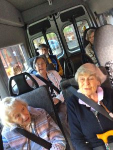 Residents from RMBI Home Cadogan Court, in Exeter, share their excitement on the Home’s mini bus after visiting Haldon Forest Park