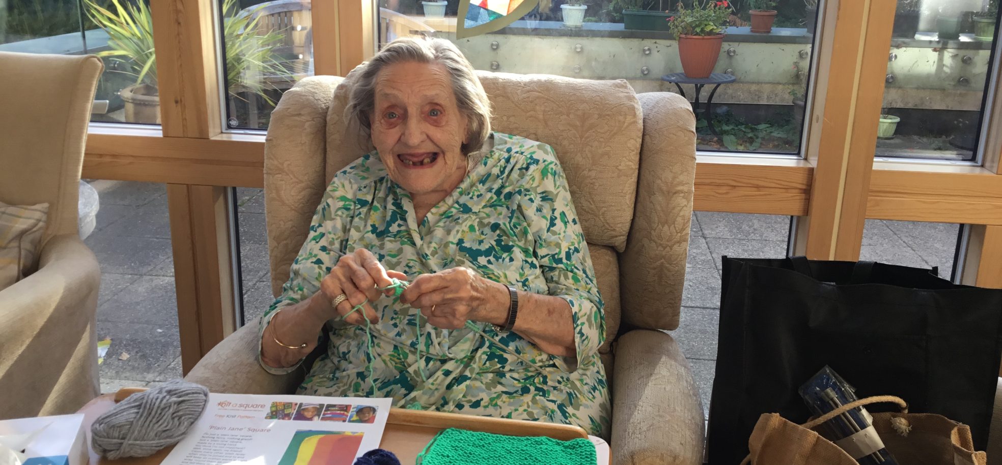 98 year old resident Marian Royston at James Terry Court in South Croydon gets knitting for charity