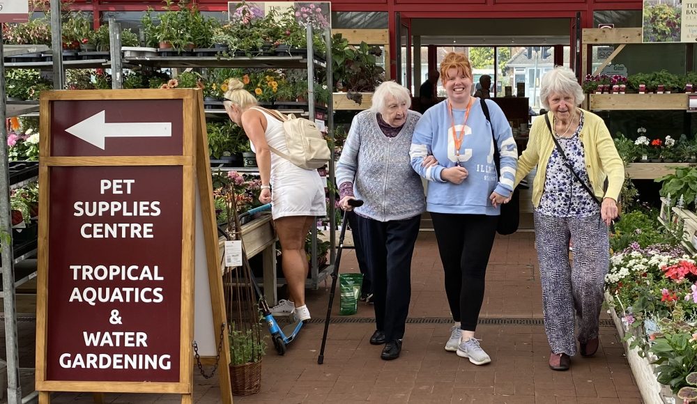 Resident Beryl Ward, Activities Coordinator Michelle Dyer and resident Joyce Drew access the local garden centre while looking for the most suitable plants for Barford Court.